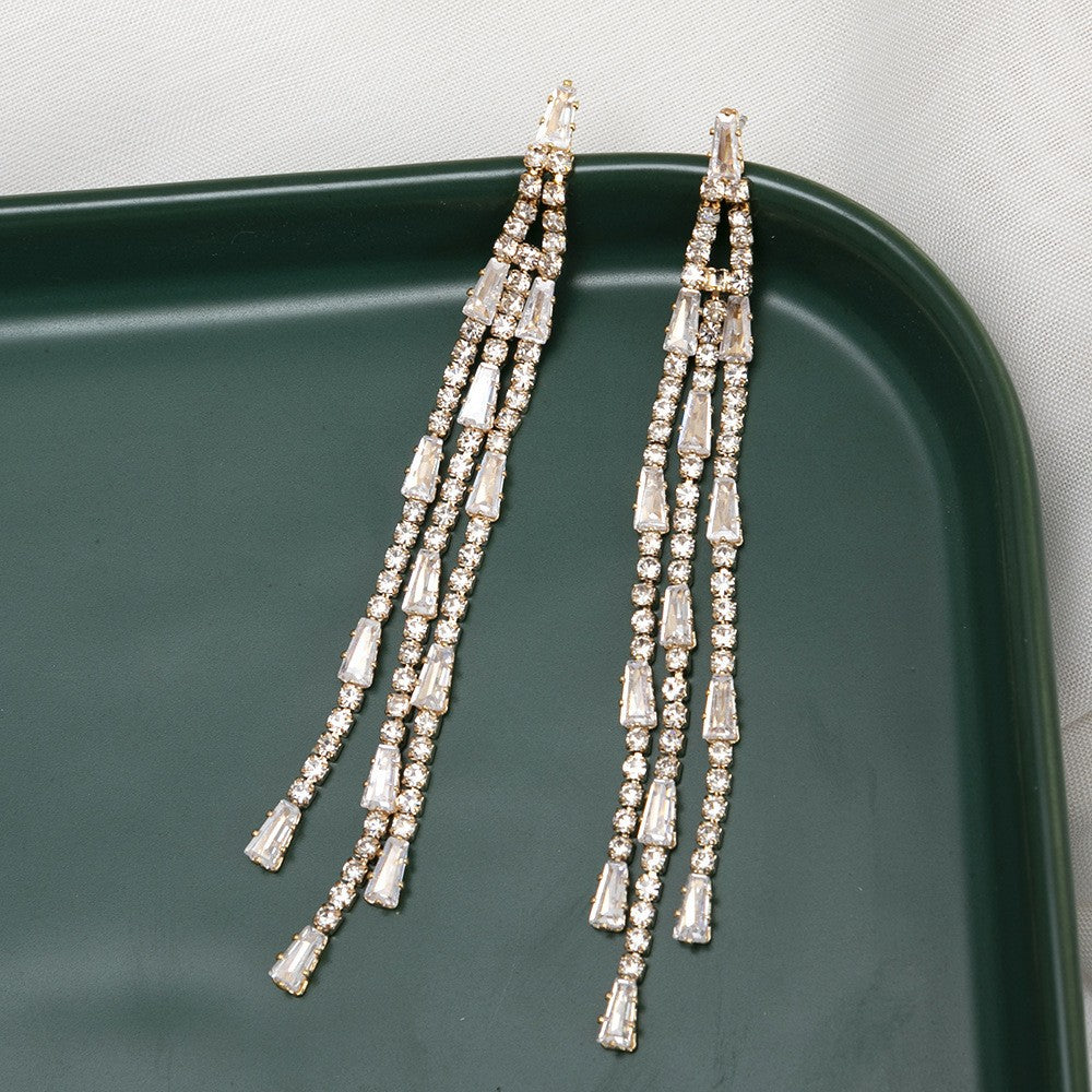 Wholesale Simple Zircon Trapezoid Dangling Tassel Rhinestone Gold-plated Claw Chain Earrings